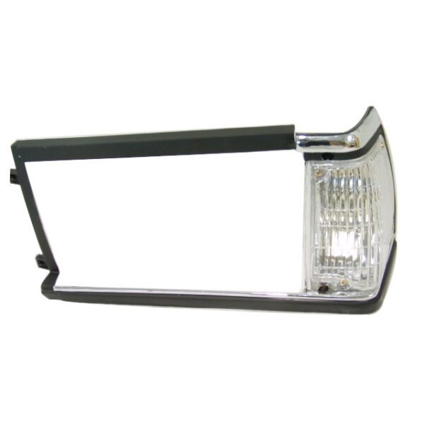 Toyota Corolla KE75 headlight rim left side 1982 - 1983